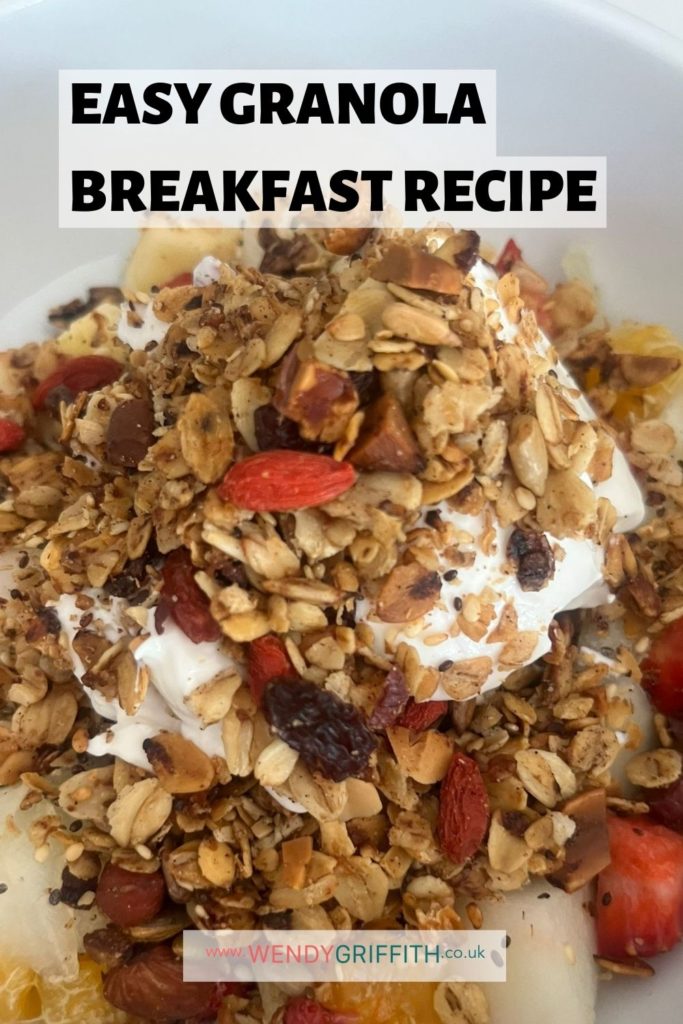 Title: Easy granola recipe
The photo is of a granola bowl for breakfast - oatmeal, goji berries, nuts, raisins, Greek yoghurt, sunflower seeds and other dried fruit.