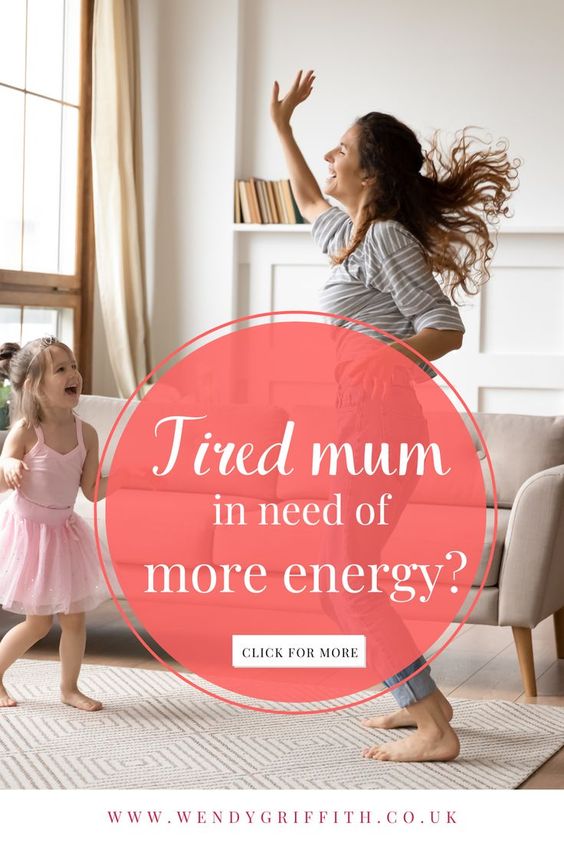 An image of an energetic mum who's dancing with her daughter in the living room. They are both laughing and with their hands in the air. The mum is wearing a striped top and blue jeans while the girl is wearing a pink dress. The image was chosen because it represents a mother that's got energy to do all that's needed for her children including having fun. The pin leads to a blog called: The first place to start for mums who need more energy, and is essentially an educational post about the gut.