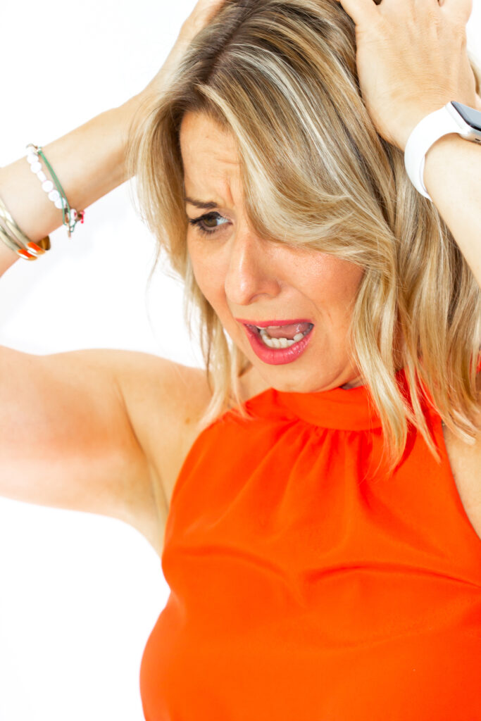 Woman feeling overwhelmed with ADHD symptoms